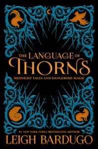 Review Round Up | The Language of Thorns, Every Heart a Doorway, and War of the Cards